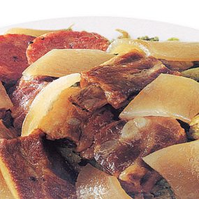 Costine di maiale con cardo